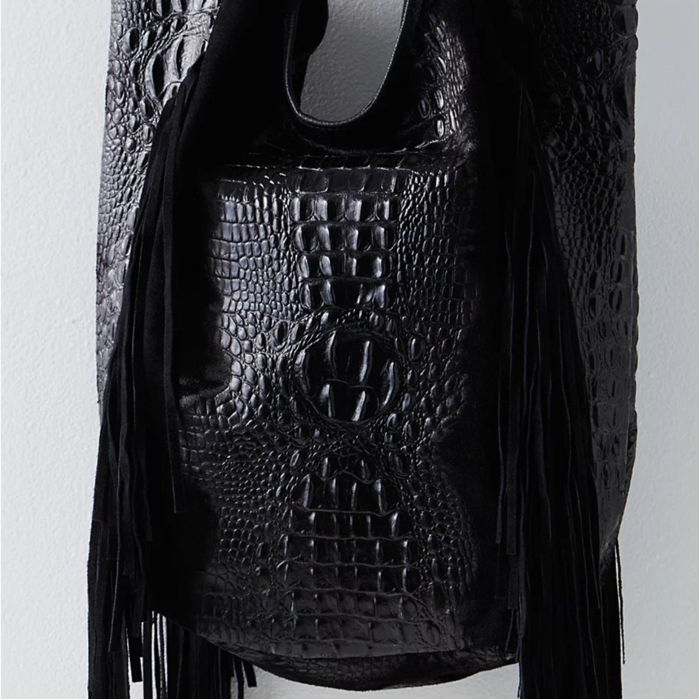 Free People Eye of the Tiger bag. Only used once. Stored in dust bag. Like new. - Picture 3 of 3